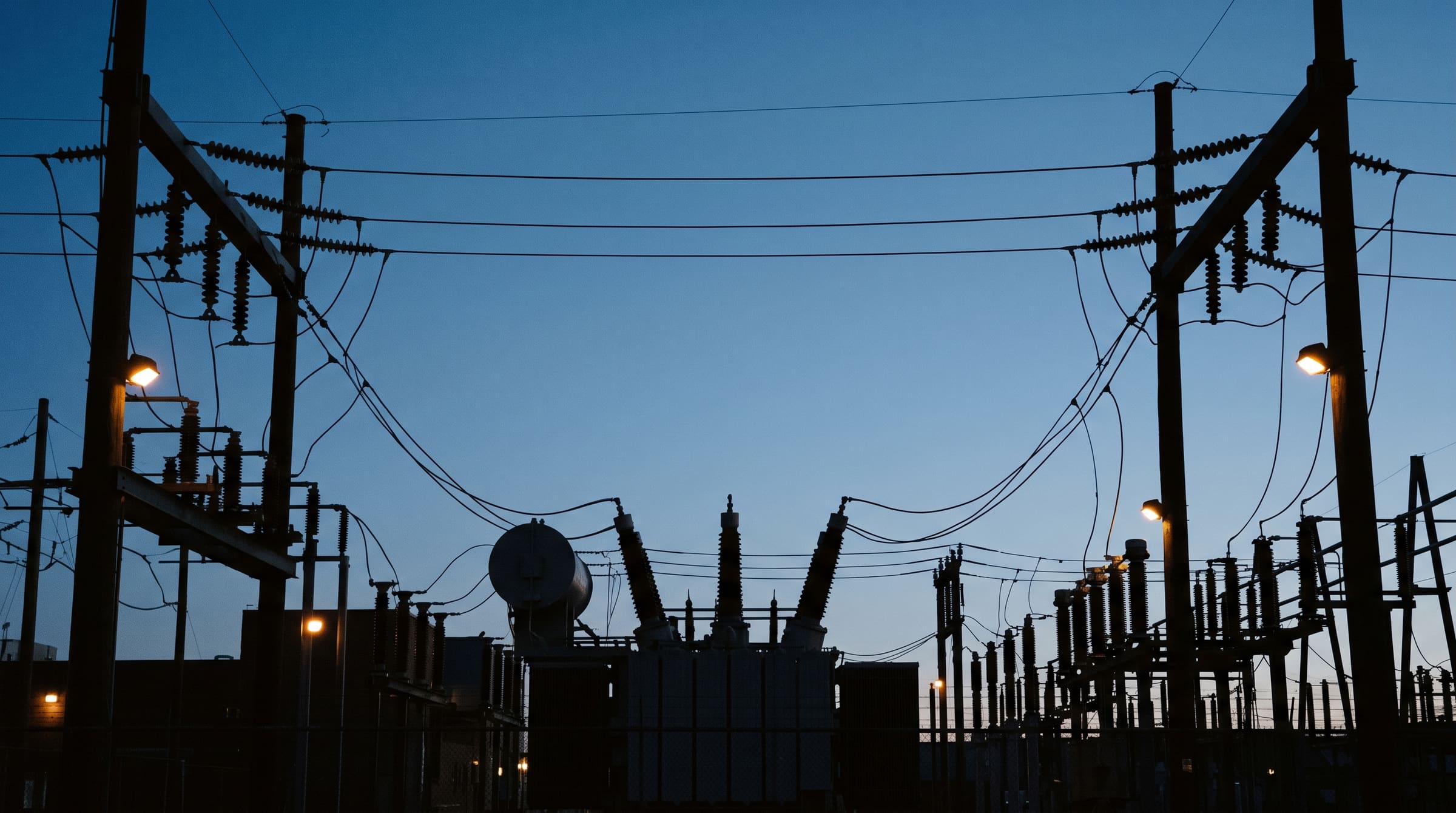 An electrical substation at blue hour.